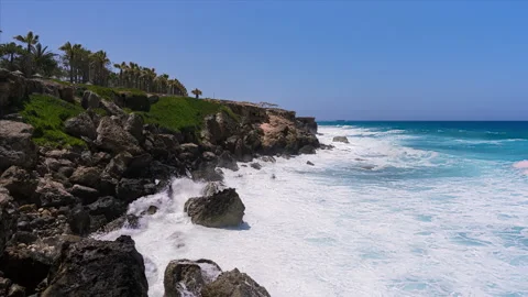 Time lapse of big ocean waves breaking on rocks of a tropical island Stock-Footage 227557693