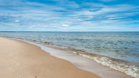 Time lapse of big white clouds moving over a Baltic Sea Stock Footage 51710831