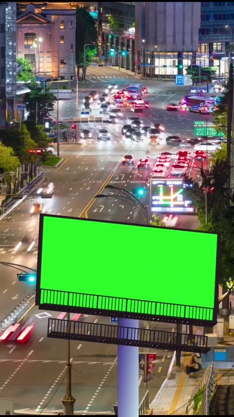 Time Lapse. Billboard with Green Screen on Busy Street. Stock Footage 296924229