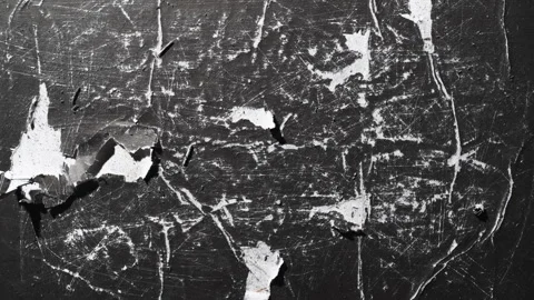 Time lapse of black poster paper texture being scratched and peeled over time Stock Footage 335643447
