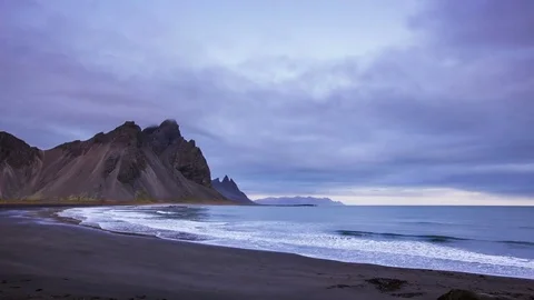 Time Lapse - Black Sand beach of the coastline with mountains in Iceland Stock Footage 72751819