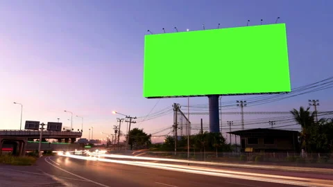 Time Lapse of Blank Billboard with a Green Screen with light trail Stock Footage 252376160