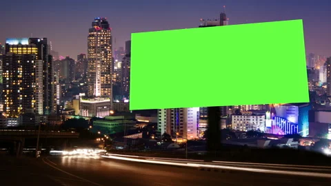 Time Lapse of Blank Billboard with a Green Screen with light trail Stock Footage 252376233