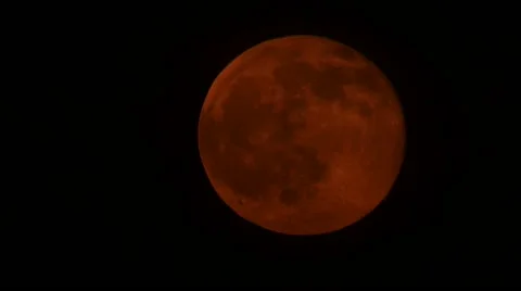 Time lapse of Blood Moon behind clouds Stock Footage 51135331