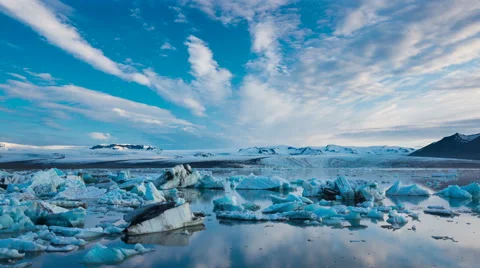 Time Lapse of blue icebergs floating in Jokulsarlon glacial lagoon Stock Footage 52222600