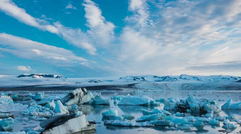 Time Lapse of blue icebergs floating in Jokulsarlon glacial lagoon Stock Footage 52222697