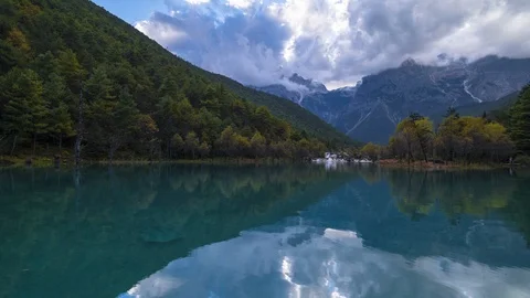 Time lapse of Blue Moon Valley, White Water River, in Jade Dragon Snow Mountain Stock Footage 118773839