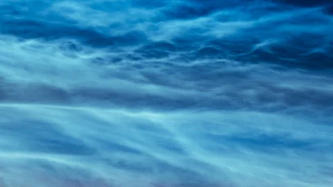 Time lapse of blue silvery clouds or noctilucent clouds or night shining clouds. Stock Footage 156523457