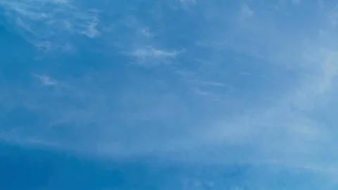 Time lapse of blue sky and white clouds moving around. Stock Footage 107092100
