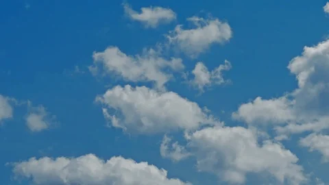 Time lapse of blue sky and white clouds moving around. Stock Footage 107182799