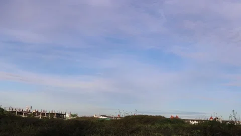 Time lapse, blue sky and white cloud background over building Stock Footage 139903283