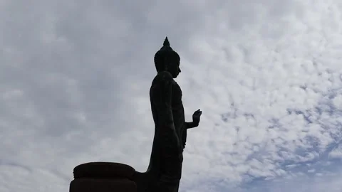 Time lapse, blue sky and white cloud, right of Buddha statue Stock Footage 140108881