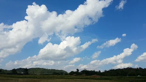Time lapse blue sky with beautiful clouds at the rice field, Thailand Stock Footage 108202648