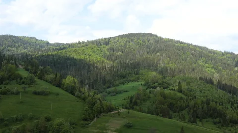 Time lapse of blue sky with clouds over mountain Stock Footage 108893701