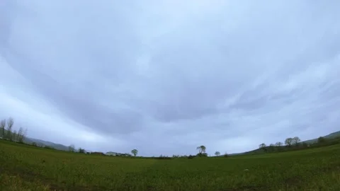 Time lapse blue sky, clouds, rain and field Video stock 150848214