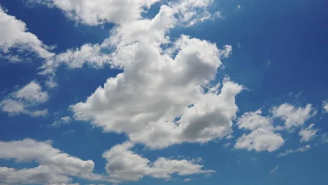 Time lapse of blue sky with clouds moving in the day Stock Footage 155216004