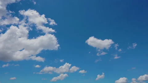 Time lapse of blue sky with clouds moving in the day Stock Footage 155216039