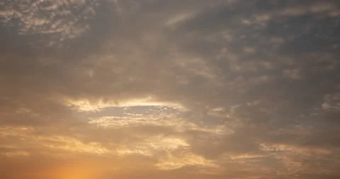 Time lapse of blue sky with clouds and sun, clouds at sunrise, evening Stock Footage 187478705