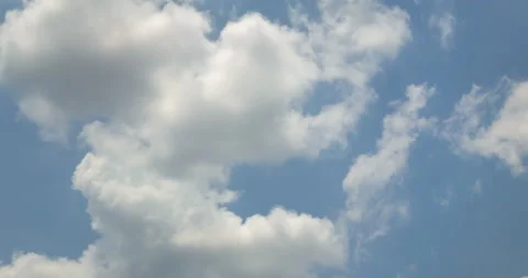 Time lapse Blue sky fluffy white clouds on summer season bright clear skyline wi Stock Footage 160793948