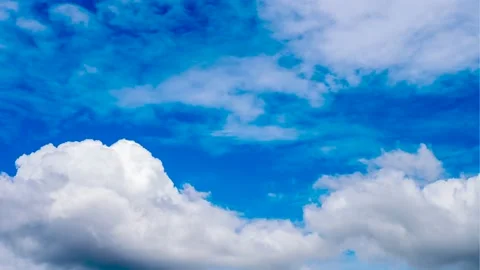Time lapse Blue sky fluffy white clouds on summer season bright clear skyline wi Stock Footage 218412317