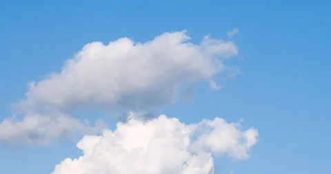 Time lapse Blue sky fluffy white clouds on summer season bright clear skyline wi Video stock 218412993