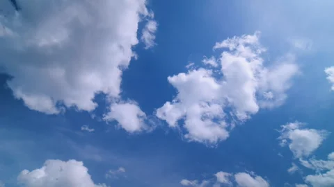 Time lapse of a blue sky with moving clouds Stock Footage 277476671