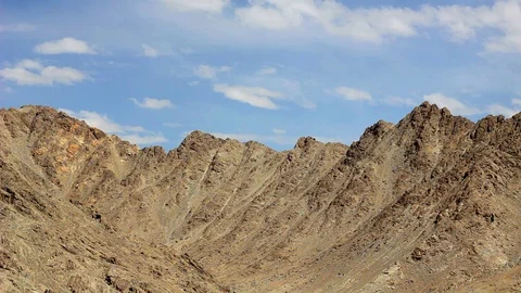Time lapse blue sky over the desert mountains Stock Footage 95646874