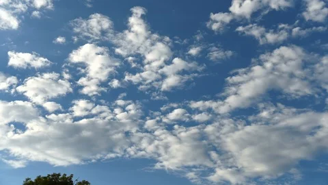 Time Lapse of Blue sky with white clouds in motion. Stock Footage 91625883