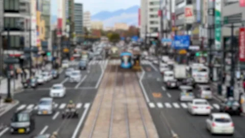 Time Lapse blurred video of a bustling street with numerous cars, buses, and Vidéo 277511612