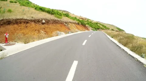 Time lapse On-board-camera on a mountain road Stock Footage 58586690