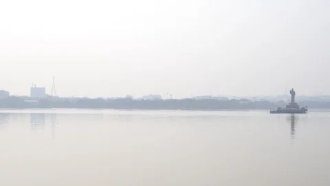 Time lapse-Boating-Hussain-Sagar-lake-Buddha-Statue Stock Footage 100145265