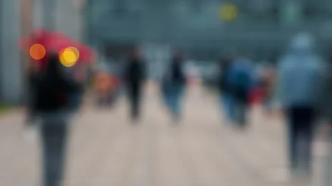 Time-lapse bokeh blurred busy street people crowd walking sidewalk Stock Footage 337647496