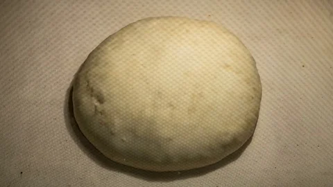Time lapse. Bread is baked and bruised in the oven Stock Footage 76406853