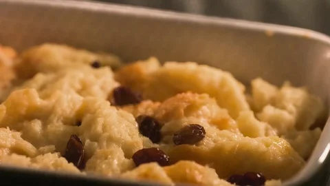 Time lapse of bread pudding inside an oven Stock Footage