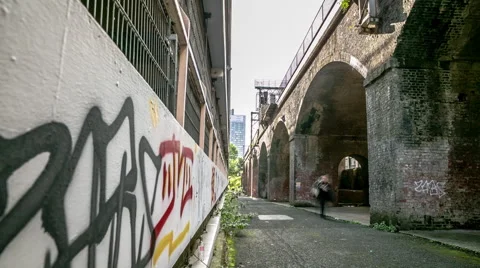 Time lapse of bridge arches and graffiti on wall Stock Footage 45721542