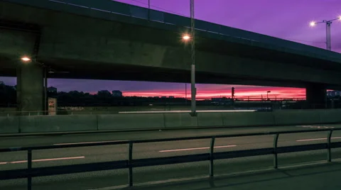 A time-lapse of a bridge during magic hour, Sweden, Skanstullsbron 1086 Vidéo 54960311