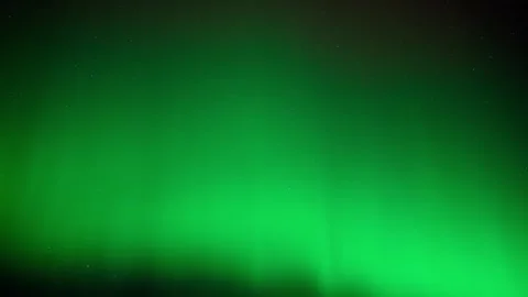 Time lapse of bright green Aurora flashing across a star filled sky. Only sky  Stock Footage 287958576
