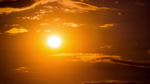 Time Lapse Bright Orange Sunset Sun Sets Behind the Clouds Stock Footage 211124655