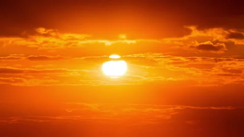 Time Lapse Bright Orange Sunset Sun Sets Behind the Clouds Stock Footage 211473228