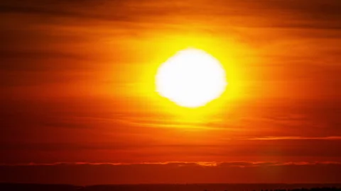 Time Lapse Bright Orange Sunset Sun Sets Behind the Clouds Stock Footage 232102492