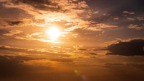 Time Lapse Bright Orange Sunset Sun Sets Behind the Clouds Stock Footage 241301916