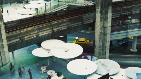 Time-lapse of BTS skytrain and traffic near MBK Center, Bangkok Stock Footage 345865271