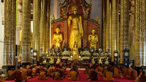Time-lapse: Buddhist monks praying in the church in Thailand. 4K Stock Footage 121497587