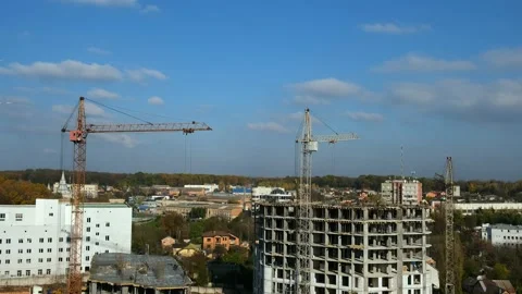 Time lapse builders and cranes working on the construction site Stock Footage 143013855