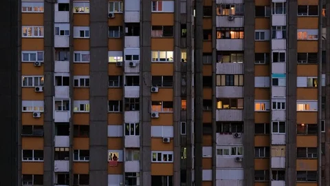 Time lapse of a building facade from day to night Видео 129728907
