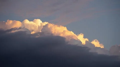Time lapse of building storm clouds with sunset colors Stock Footage 313063317