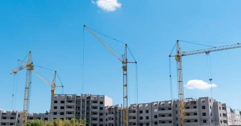 Time lapse of Building Under Construction, Crane and beautiful clouds no bird Stock Photos
