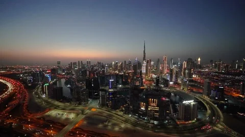 Time lapse of Burj Khalifa and skyscrapers. Evening falls on the city Video stock 222573015