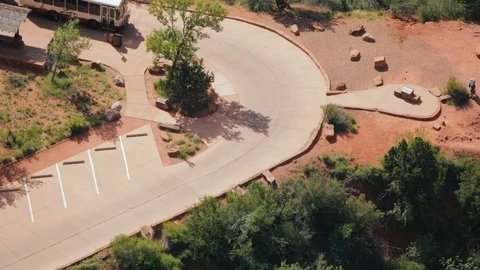 Time-lapse of bus going through bus stop in desert Stock Footage 128777558