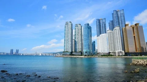 Time lapse of Busan City and Haeundae Beach at Busan in Korea. Video stock 80597568